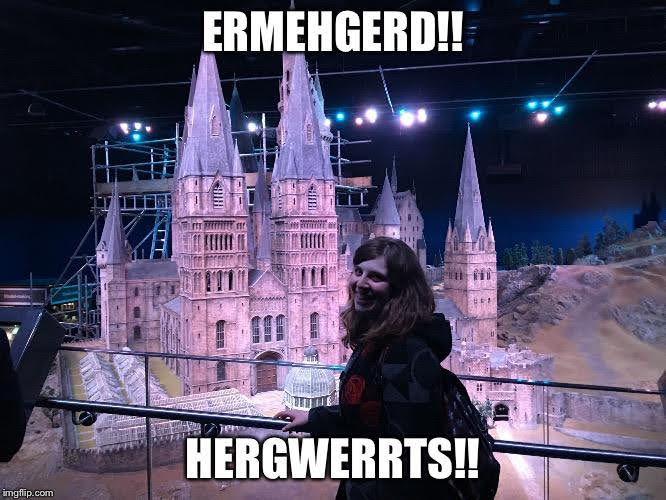 Me standing in front of the Hogwarts model